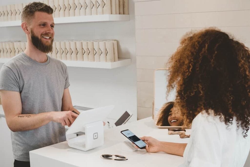 Storefront employee delivers personalized customer service.
