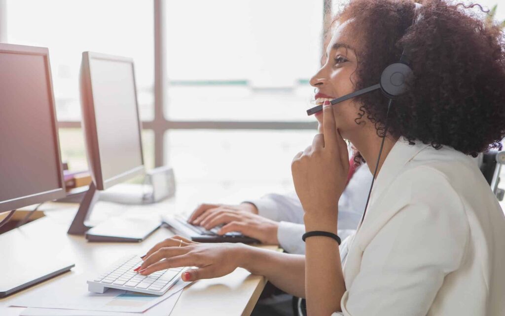Hispanic person on phone call in call center