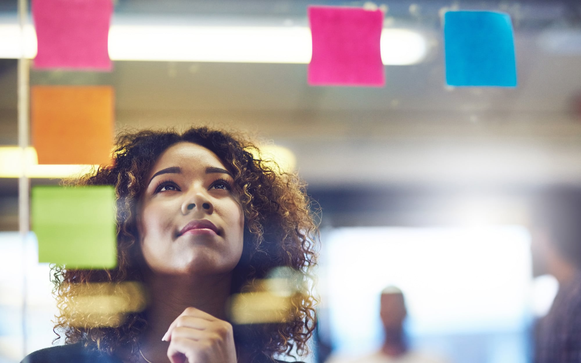 A business woman looks at two options for approaches to call center strategies for b2b and b2c
