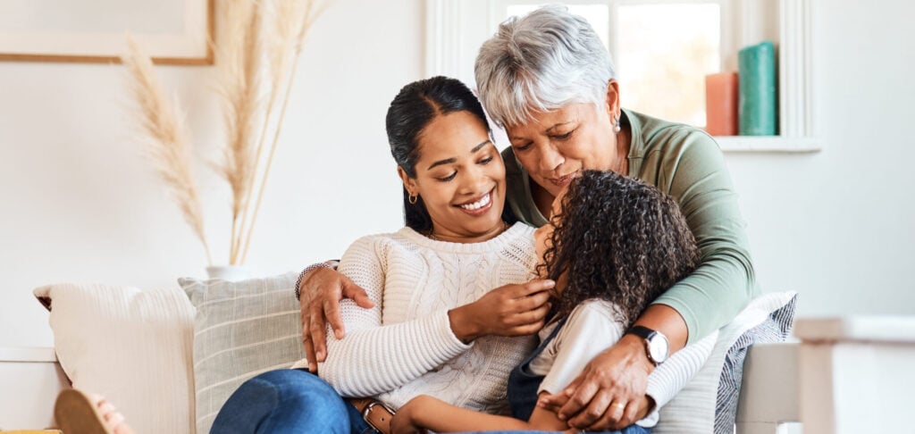 Shot of a grandmother spending time with her daughter and grandchild at home.